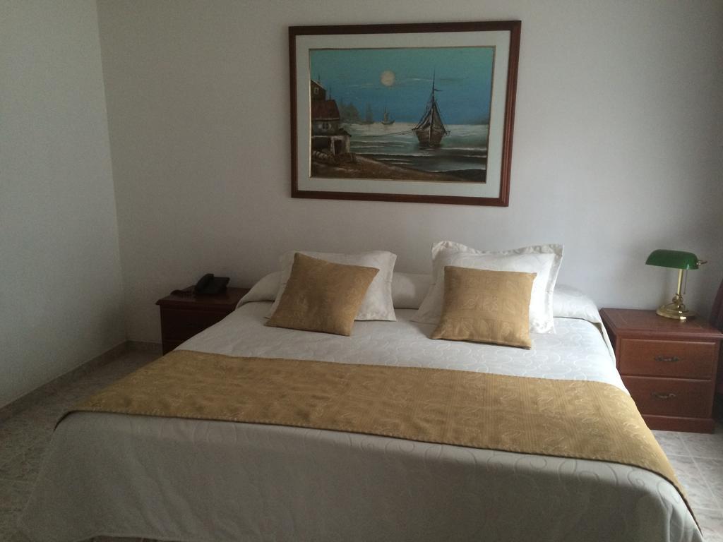 Hotel Bolivar Plaza Manizales Habitación foto